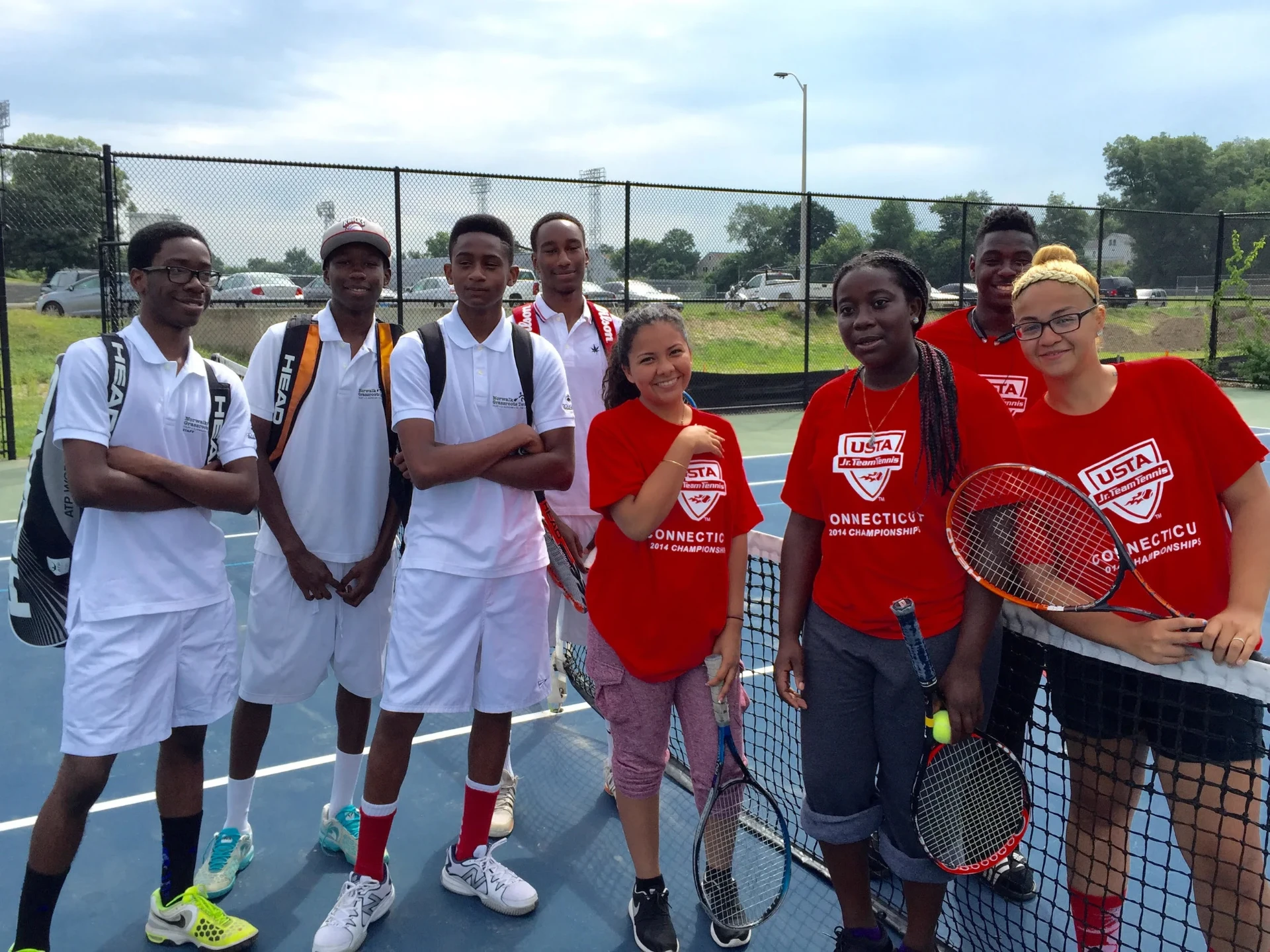 First Serve Bridgeport students and coaches on the court